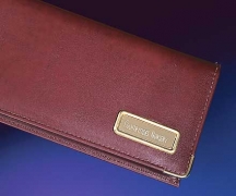 Learn more about Personalized Burgundy Leather Partner Cover